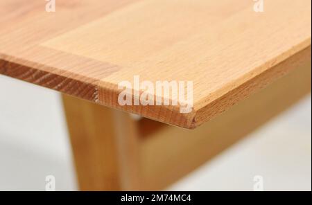 Wooden table top surface isolated over white background. Solid wood furniture close view 3D illustration Stock Photo