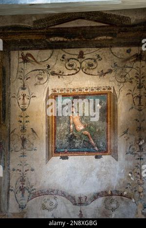 Well preserved fresco in the Casa Degli Amorini in the ruins of Pompeii Stock Photo