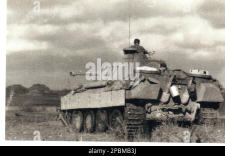 World War Two B&W photo A Panther Tank stands ready to support an attack by German Troops during the Spring months of 1944. The Panther is from the 1st SS Panzer Division on the Korsun Pocket Eastern Front Stock Photo