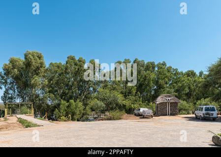 Douglas, South Africa - Mar 1, 2023: The viewpoint at Samevloeiing near Douglas where the Orange and Vaal Rivers join. Vehicles are visible Stock Photo