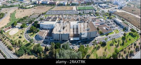 Aerial panoramic drone view of the Juan Ramon Jimenez University Hospital, a public hospital complex belonging to the Andalusian Health Service locate Stock Photo