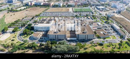 Aerial panoramic drone view of the Juan Ramon Jimenez University Hospital, a public hospital complex belonging to the Andalusian Health Service locate Stock Photo