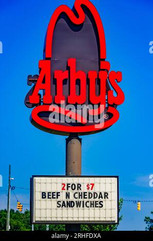 Arby’s advertises its beef n’ cheddar sandwiches, Aug. 15, 2023, in Grand Bay, Alabama. Arby’s was founded in Ohio in 1964. Stock Photo