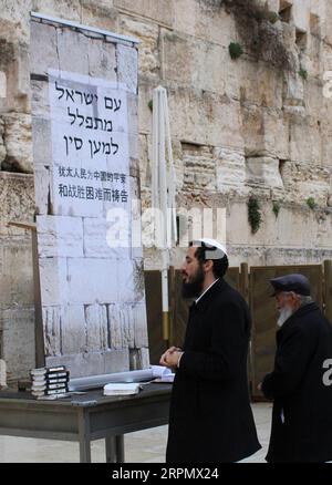 200218 -- BEIJING, Feb. 18, 2020 -- Jewish worshipers gather at the Western Wall in Jerusalem s Old City on Feb. 16, 2020, to pray in solidarity with China s fight against novel coronavirus epidemic.  XINHUA PHOTOS OF THE DAY ShangxHao PUBLICATIONxNOTxINxCHN Stock Photo