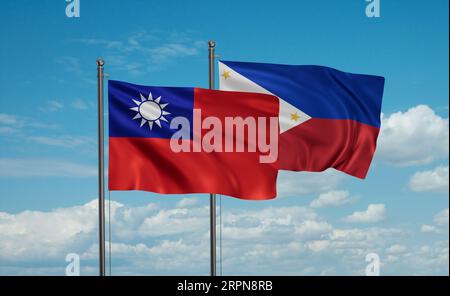 Philippines and Taiwan flag waving together in the wind on blue sky, two country cooperation concept Stock Photo