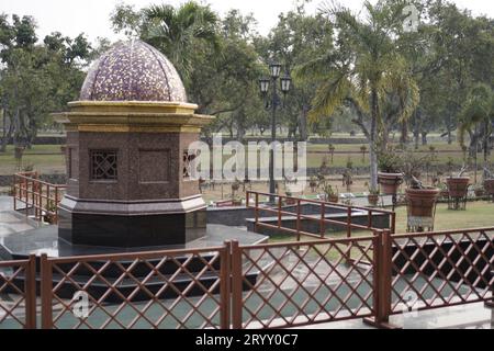 a small domed monument, with ceramic material surrounding it. Stock Photo