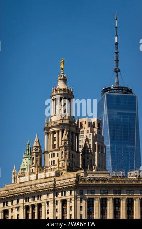 David Dinkins municipal building with the One World Trade Center in the background in downtown Manhattan NYC Stock Photo