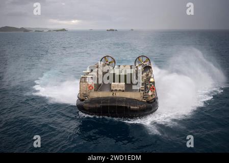 Landing Craft Air Cushion approaches the well deck of USS Bonhomme Richard. Stock Photo