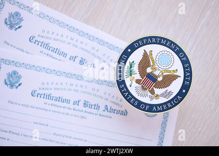 KYIV, UKRAINE - MARCH 9, 2024 US Department of State seal on Certification of Birth Abroad close up Stock Photo