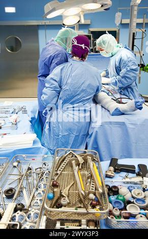 Hip joint replacement, traumatology operating room. Hospital ...