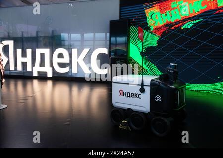 Moscow, Russia. 19th of April, 2024. An Yandex autonomous delivery robot is on display iduring the Russia Expo international exhibition and forum at the VDNKh exhibition centre in Moscow, Russia Stock Photo