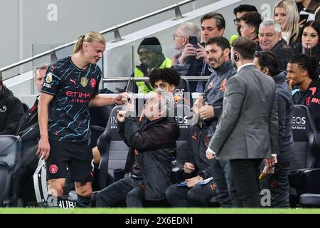 London, UK. 14th May, 2024. Erling Haaland of Manchester City jokes with Manchester City coaching staff during the Premier League match Tottenham Hotspur vs Manchester City at Tottenham Hotspur Stadium, London, United Kingdom, 14th May 2024 (Photo by Mark Cosgrove/News Images) in London, United Kingdom on 5/14/2024. (Photo by Mark Cosgrove/News Images/Sipa USA) Credit: Sipa USA/Alamy Live News Stock Photo