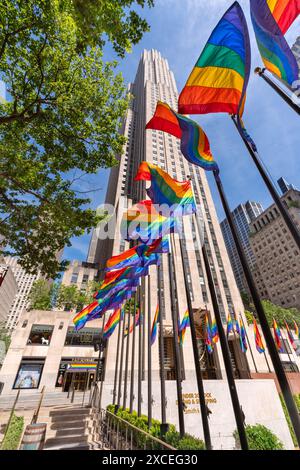 Rockefeller Center with installation of rainbow color flags celebrating LGBTQ+ Pride month. Midtown Manhattan, New York City Stock Photo