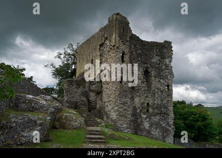 Peveril Castle is a ruined 11th-century castle overlooking the village of Castleton in Derbyshire in the Hope Valley. Stock Photo