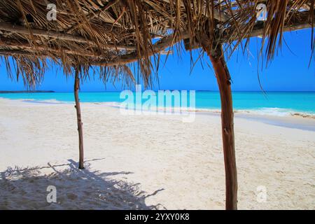 Straw hut at Fayaoue beach on the coast of Ouvea lagoon, Mouli and Ouvea Islands, Loyalty Islands, New Caledonia. Stock Photo