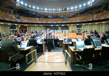 Senedd Welsh Assembly Debating Chamber AMs sit in front of their computer terminals Cardiff Bay Wales UK GB Stock Photo