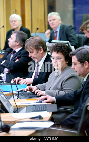 Senedd Welsh Assembly Debating Chamber AMs sit in front of their computer terminals Cardiff Bay Wales UK GB Stock Photo