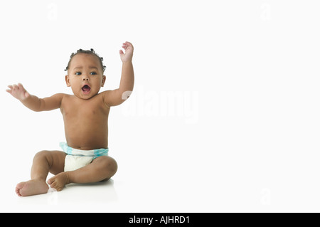 Baby waving his arms Stock Photo