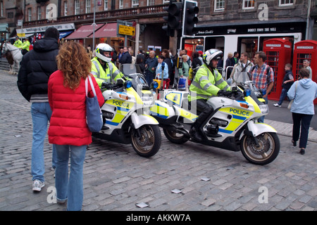 Lothian and Borders police motorcyclist patrol The Royal Mile Edinburgh Scotland UK Europe Stock Photo