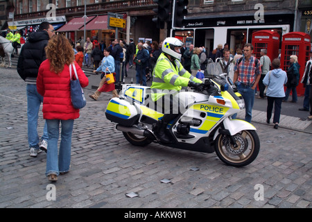 Lothian and Borders police motorcyclist patrol The Royal Mile Edinburgh Scotland UK Europe Stock Photo