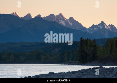 View of Seven Sisters mountain range from Skeena river near Hazelton BC Stock Photo