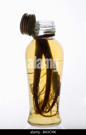 Bottle of ginseng Stock Photo