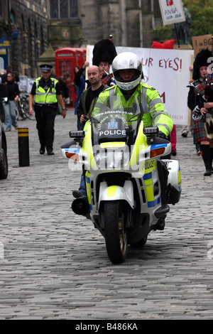 motor cycle policeman on duty on the Royal Mile Edinburgh Scotland Stock Photo