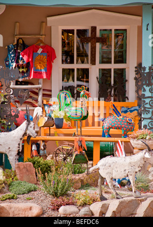 A whimsical sculpture garden stands in front of an art gallery, in the arts and crafts town of Arroyo Seco, New Mexico. Stock Photo