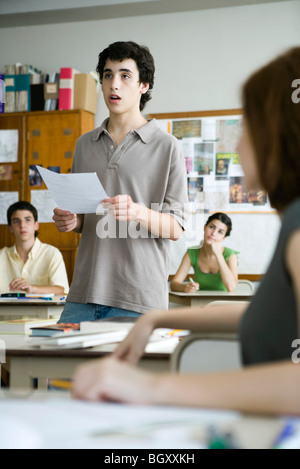 High school student giving presentation in class Stock Photo