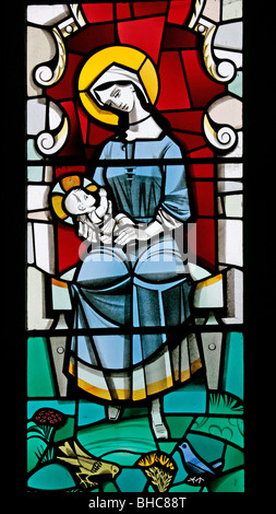 A modern stained glass window depicting Virgin Mary and infant Jesus, by Harry Harvey, St Mary's Church, Leake, North Yorkshire Stock Photo