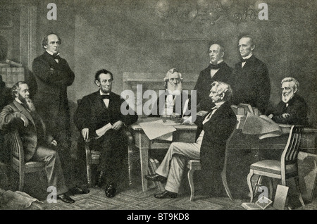 President Abraham Lincoln does the first reading of a draft of the Emancipation Proclamation in 1864 with his cabinet: Stock Photo