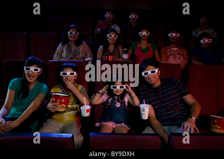 People watching a movie with 3D glasses Stock Photo