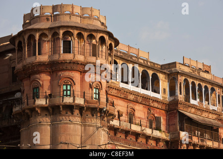 Traditional architecture ancient building fronting the famous Ghats by The Ganges River in Holy City of Varanasi, India Stock Photo