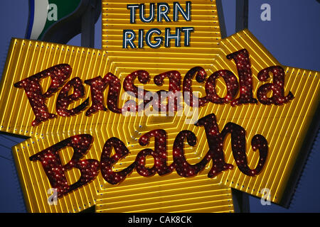 Sep 24, 2007 - Pensacola Beach, Florida, USA - The famous Pensacola Beach sign that has pointed the way to Pensacola Beach for nearly half a century is now fully repaired. The sign is a familiar landmark at the foot of the Bob Sikes Bridge overpass and was heavily damaged by hurricanes and tropical  Stock Photo