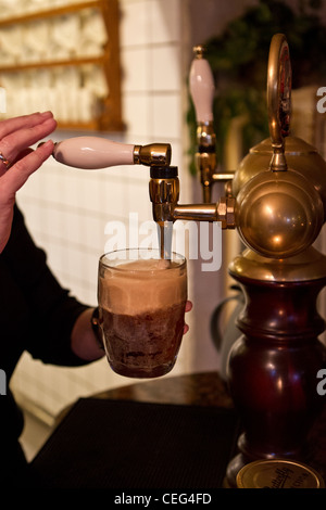 pulling pint of ale Stock Photo