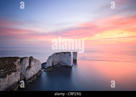 Sunrise at Old Harry Rocks on Dorset's Jurassic Coast world heritage site near Swanage. Stock Photo