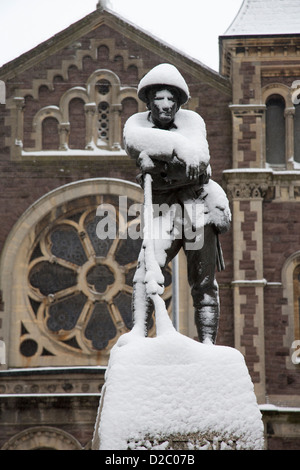 Face picked out in snow on memorial to soldiers who died in the First World War, Abergavenny, Wales, UK Stock Photo