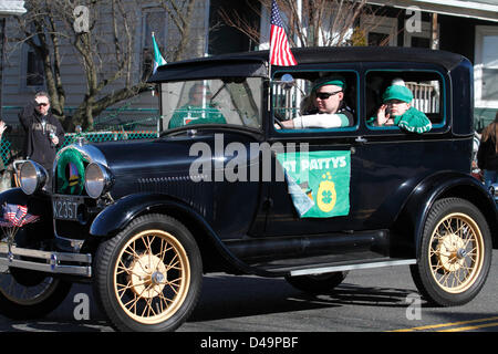 South Amboy, NJ, USA. 9th March, 2013. Old Car driving in St. Patrick's Day Parade in South Amboy, NJ Stock Photo