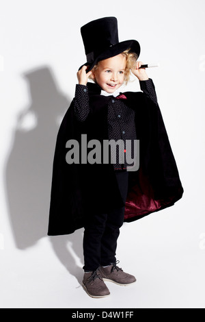 Boy wearing magician costume Stock Photo