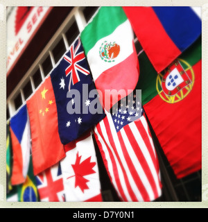 World flags hung from building Stock Photo