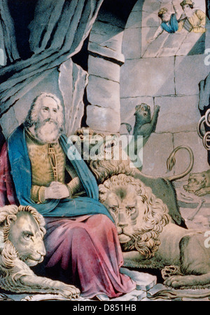 Daniel in the lions' den from the Old Testament in the Bible Stock Photo