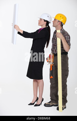 Checking the blueprints Stock Photo