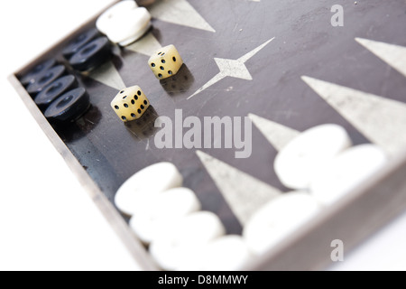 Backgammon dice and pieces isolated on white Stock Photo