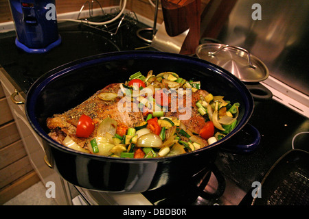 chicken in frying pan Stock Photo