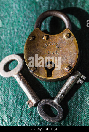 Old padlock and two keys Stock Photo