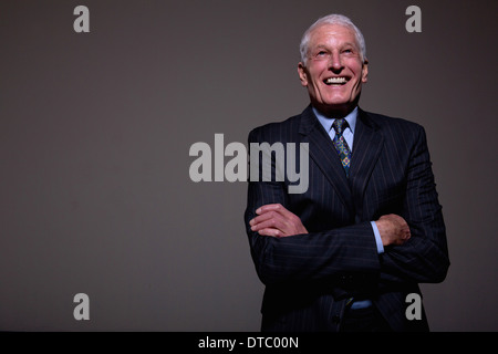 Studio portrait of senior man in suit Stock Photo