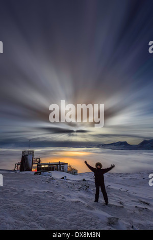 Woman happy to be at the Abisko Sky Station in Abisko, Lapland, Sweden Stock Photo