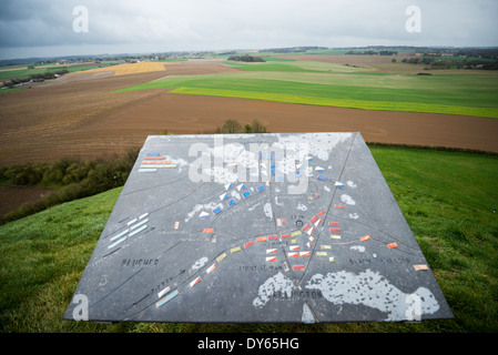 WATERLOO, Belgium — Combined view showing a detailed map of the Battle of Waterloo alongside the modern panoramic view from the Lion's Mound (Butte du Lion). The historic map illustrates the strategic positions of Wellington's Allied forces and Napoleon's French army during the decisive battle of June 18, 1815. The accompanying battlefield vista demonstrates how the landscape's topography influenced the battle's outcome. Stock Photo