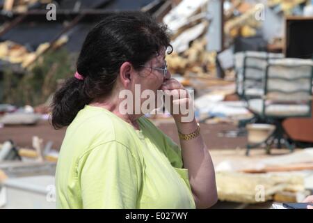 Athens, Alabama, USA. 29th Apr, 2014. A woman cries at the Billy Bob Trailer Park in Athens in Alabama, the United States, April 29, 2014. Authorities said on Monday that 15 people were killed in a string of tornadoes that ripped across large swath of the central and southern United States late Sunday and early Monday, leveling houses, downing trees and reducing everything on their ways to rubble and debris. Credit:  Marcus DiPaola/Xinhua/Alamy Live News Stock Photo