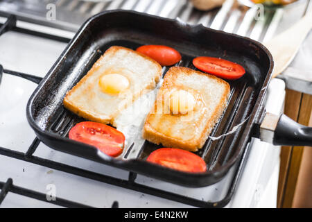 Fried egg in a frying pan Stock Photo